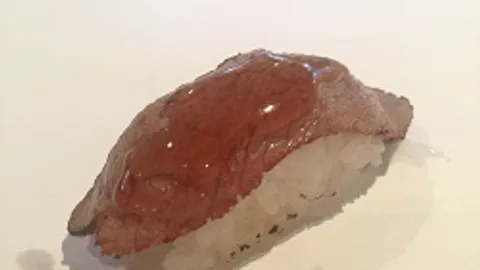 Flamed beef nigiri